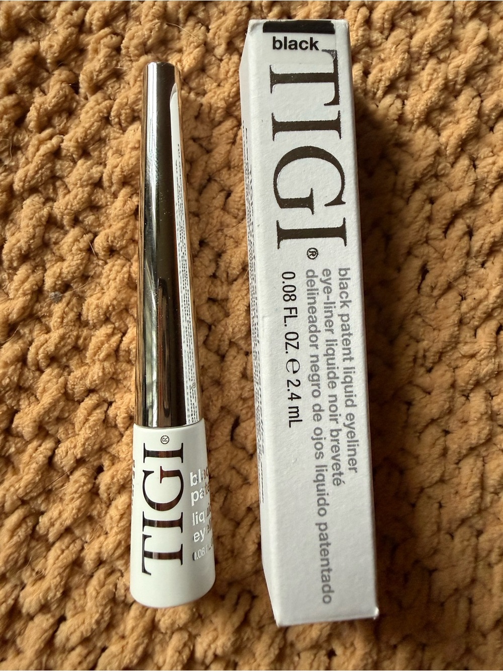 TIGI Black Patent Liquid Eyeliner – White & Silver Packaging